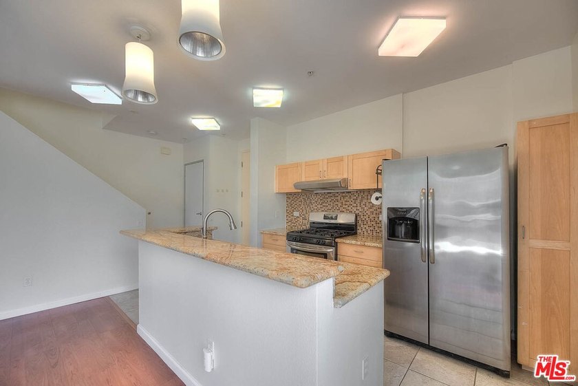 Bright, airy and built in 2007, this 2-bedroom, 1.5-bathroom - photo 11