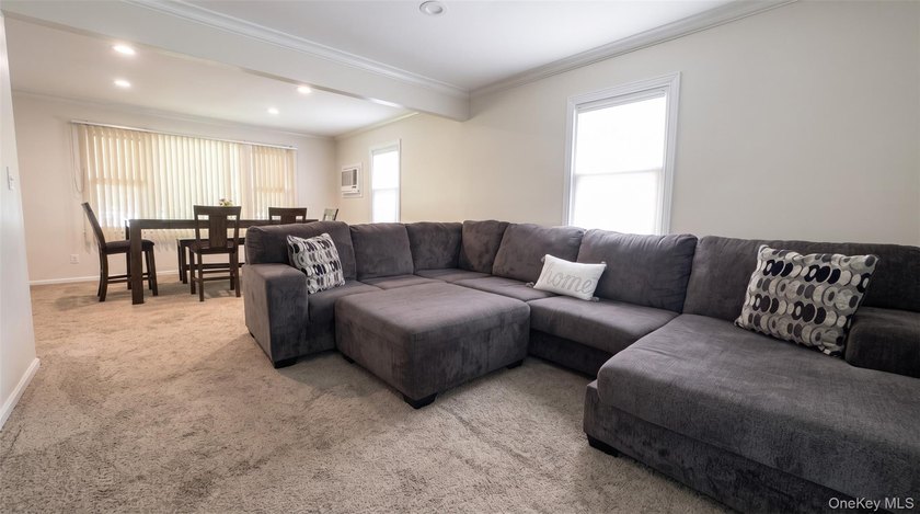 Welcome to this charming expanded home nestled on a quiet block - photo 3