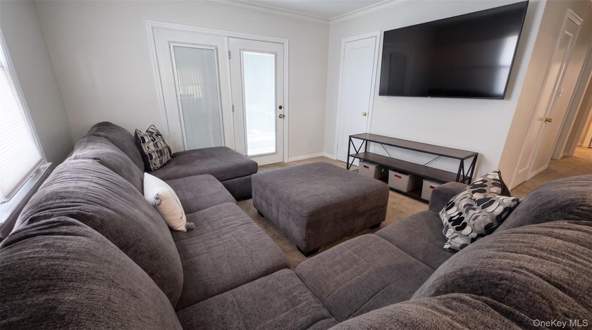 Welcome to this charming expanded home nestled on a quiet block - photo 4