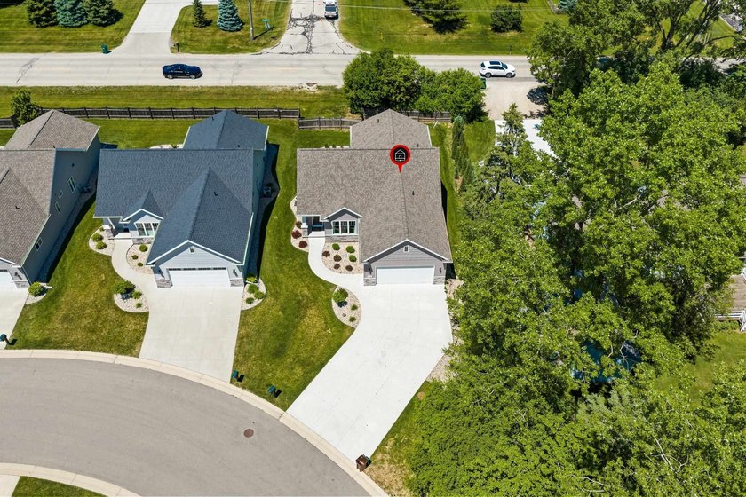 Tucked in the trees at the end of a culdesac is a gently used - photo 5