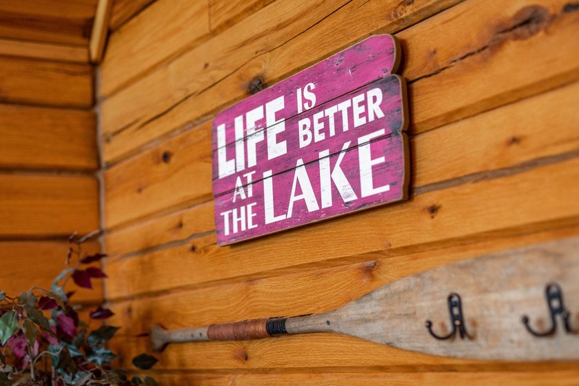Set on 2.5 acres along the shoreline, this lakefront estate - photo 11