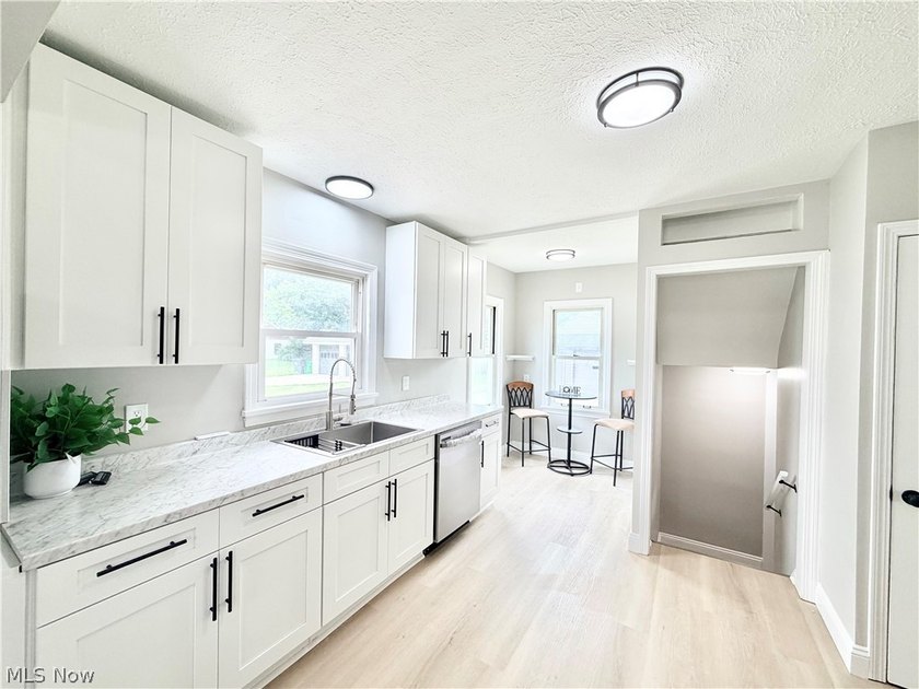 Welcome home to this fully remodeled, move-in-ready Cape Cod - photo 9