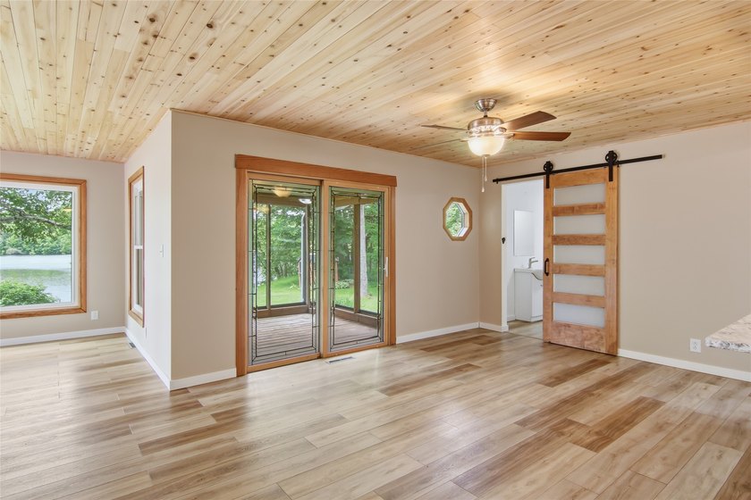 Updated house with the nicest frontage on Old Abe Lake, 200ft of - photo 13