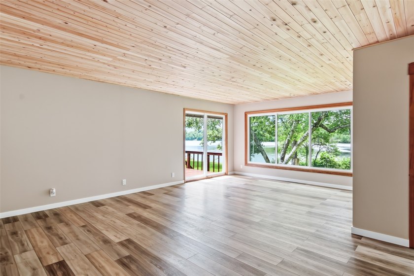 Updated house with the nicest frontage on Old Abe Lake, 200ft of - photo 14