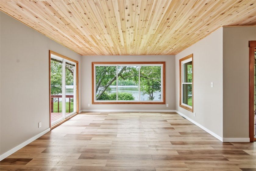 Updated house with the nicest frontage on Old Abe Lake, 200ft of - photo 15