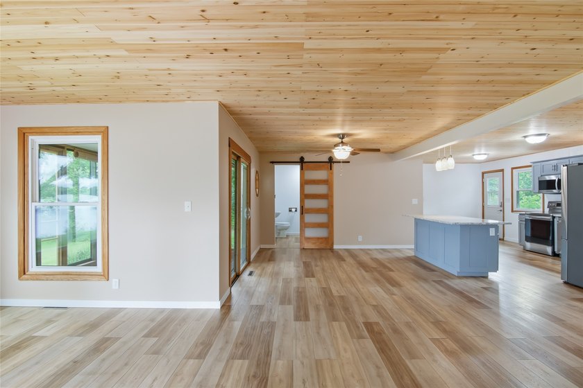 Updated house with the nicest frontage on Old Abe Lake, 200ft of - photo 16