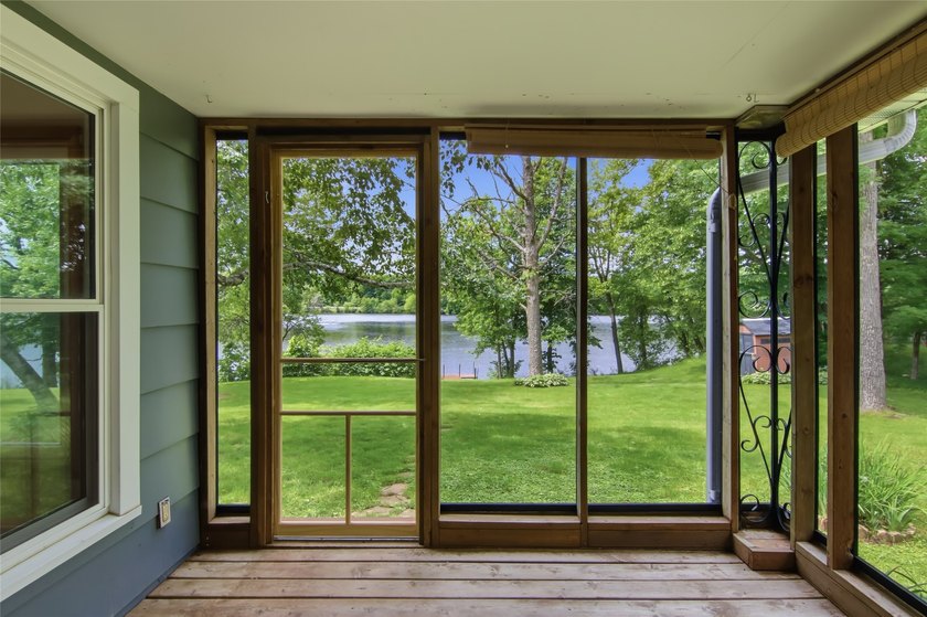 Updated house with the nicest frontage on Old Abe Lake, 200ft of - photo 18