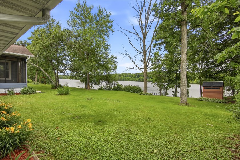 Updated house with the nicest frontage on Old Abe Lake, 200ft of - photo 30
