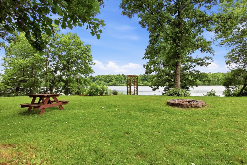 Updated house with the nicest frontage on Old Abe Lake, 200ft of - photo 31