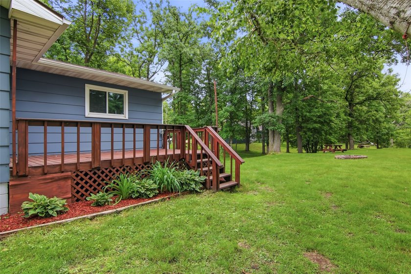 Updated house with the nicest frontage on Old Abe Lake, 200ft of - photo 35