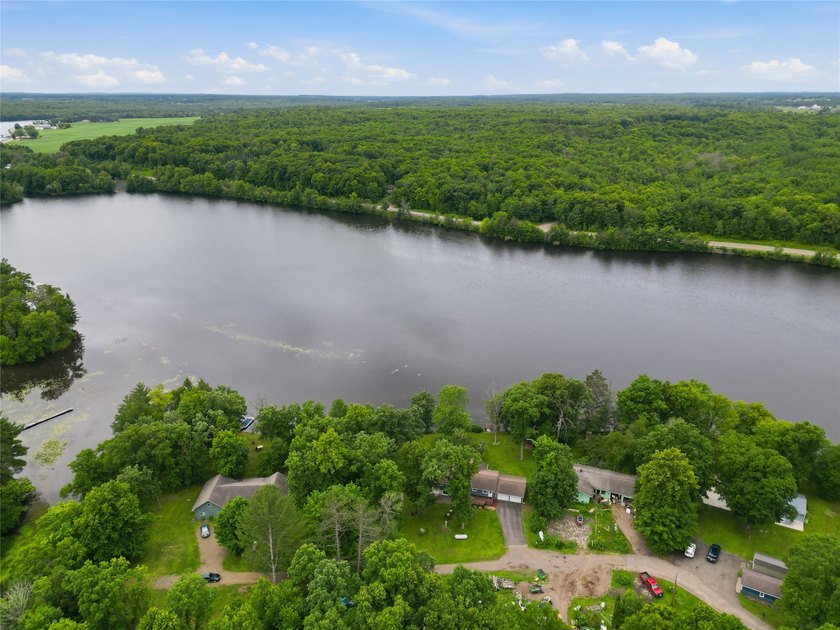 Updated house with the nicest frontage on Old Abe Lake, 200ft of - photo 43