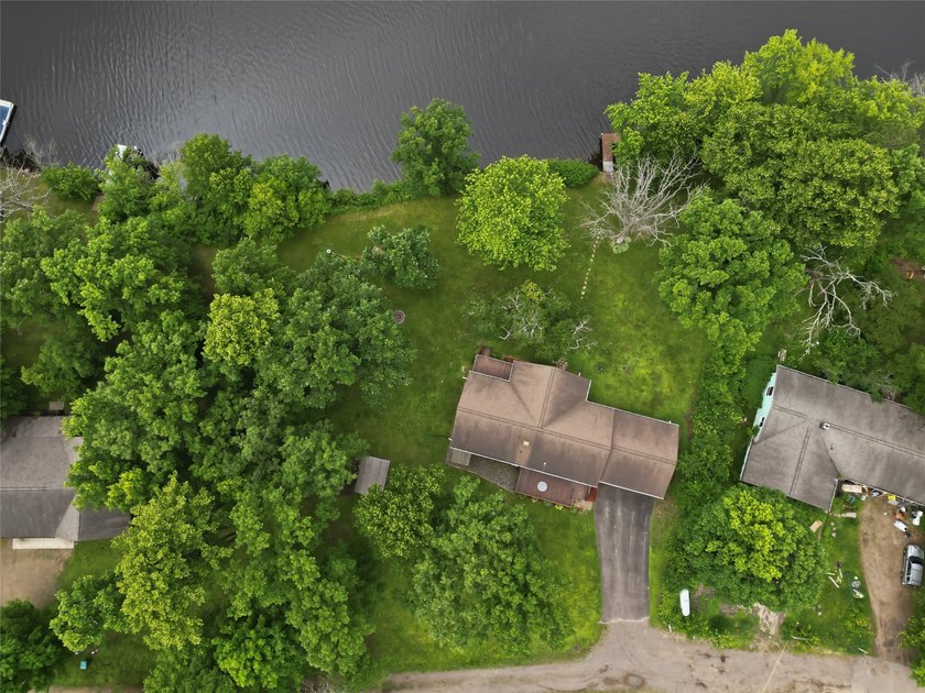 Updated house with the nicest frontage on Old Abe Lake, 200ft of - photo 45