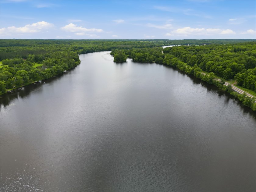Updated house with the nicest frontage on Old Abe Lake, 200ft of - photo 48