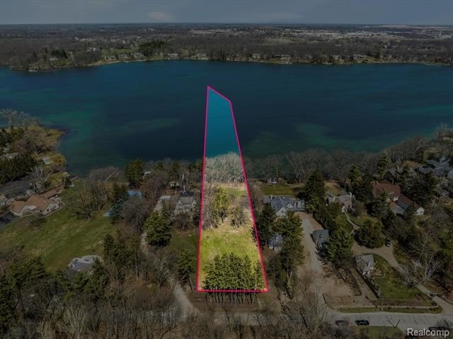 **One of the last buildable waterfront lots on prestigious Lake - photo 3