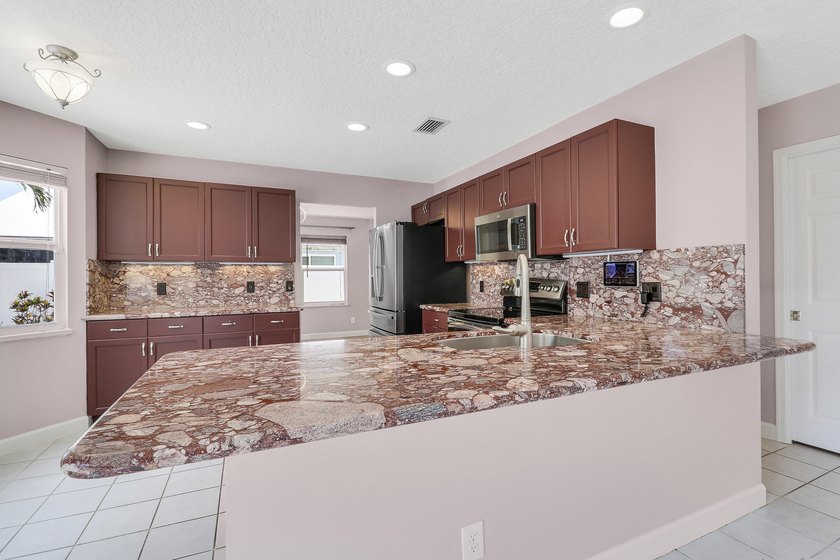 Rare opportunity in sought-after North Palm Beach Heights! This - photo 12