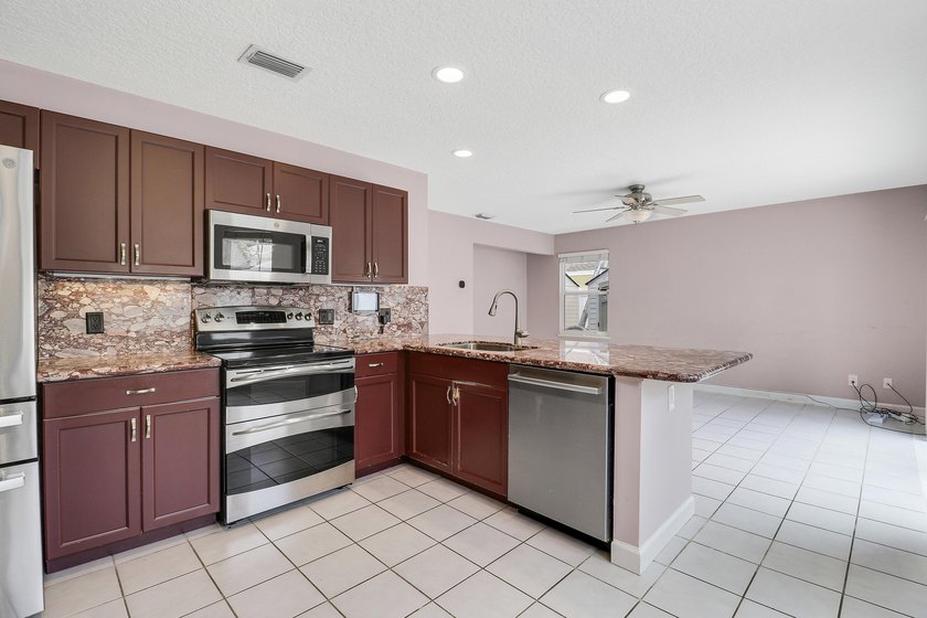 Rare opportunity in sought-after North Palm Beach Heights! This - photo 14