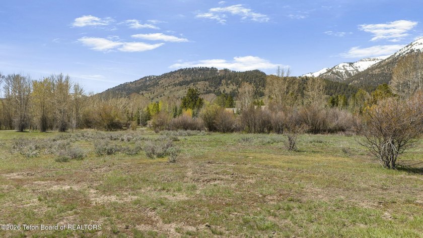 Set on 5 pristine acres in Jackson Hole, WY 83001 this - photo 5