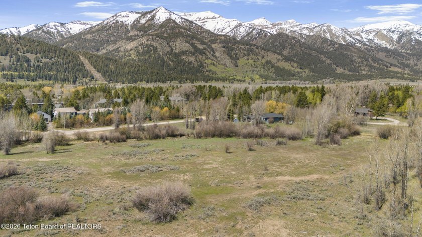 Set on 5 pristine acres in Jackson Hole, WY 83001 this - photo 10