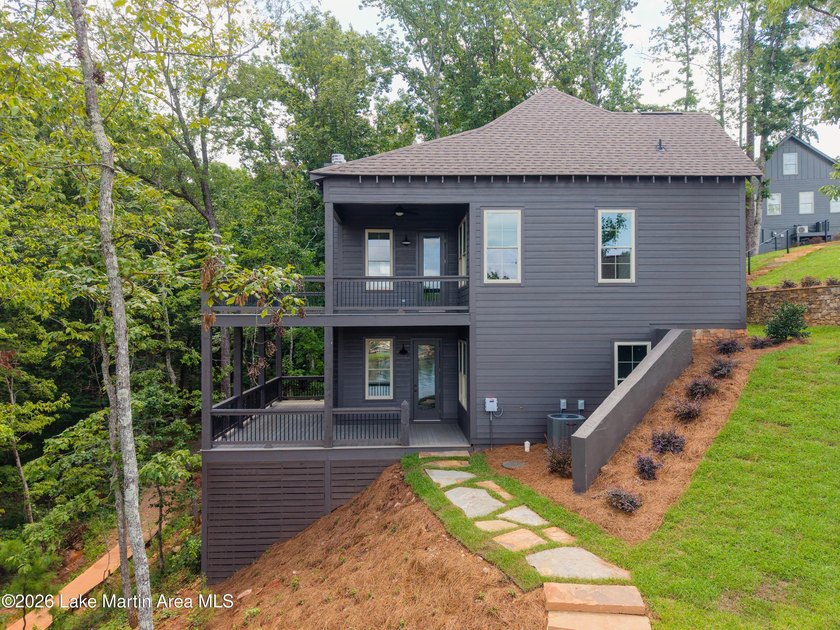Experience refined lakeside living in this beautifully appointed - photo 4