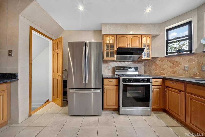 South Facing solid 20-foot wide attached brick townhouse in the - photo 5