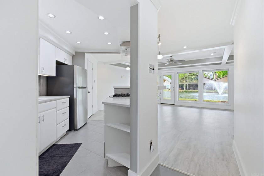 Welcome to this stunning Round River condo that perfectly blends - photo 3