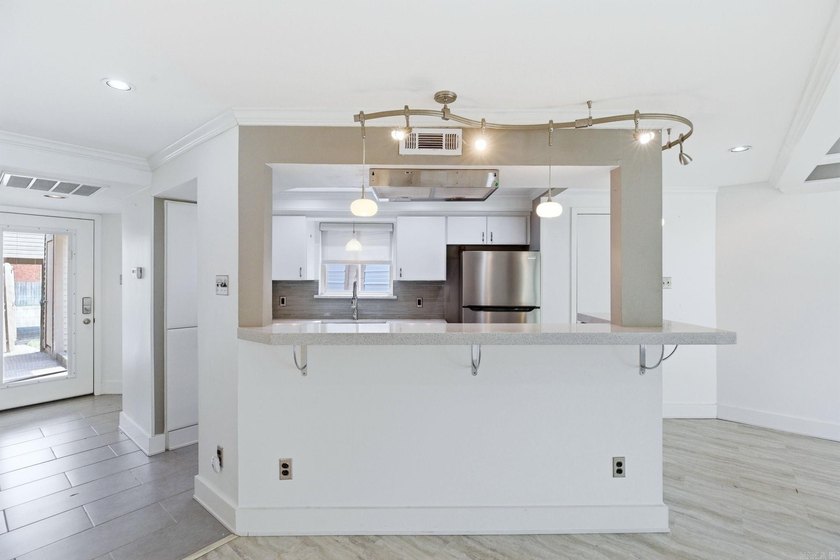 Welcome to this stunning Round River condo that perfectly blends - photo 9