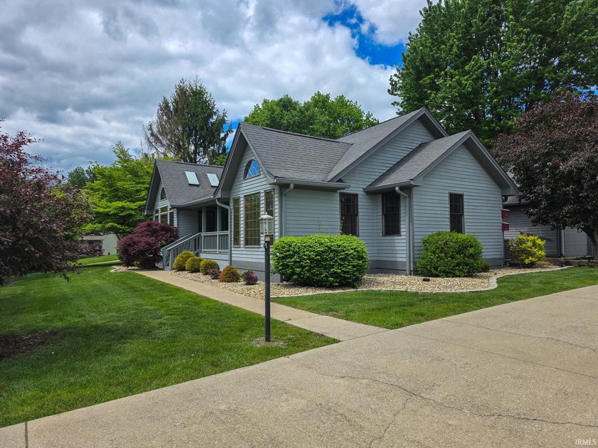 Situated on a picturesque 1.59-acre mostly level lot with a - photo 3