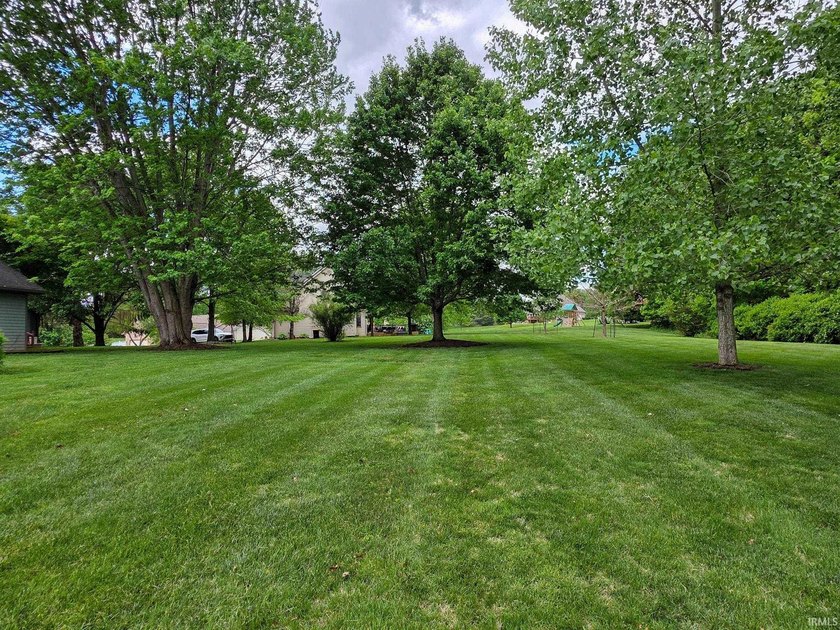 Situated on a picturesque 1.59-acre mostly level lot with a - photo 7