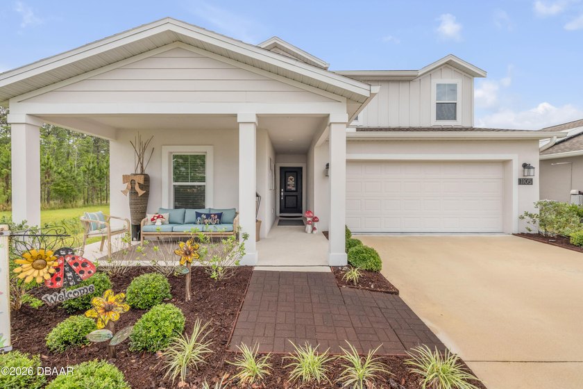 Welcome to this stunning 4-bedroom, 3-bathroom home offering 2 - photo 3