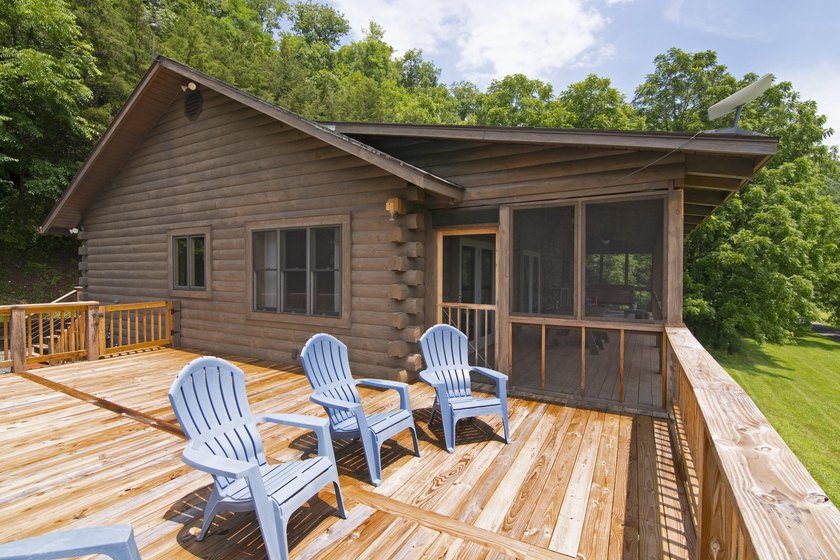 Welcome to this beautifully renovated log home tucked away in a - photo 8