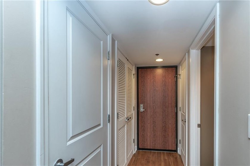 Experience urban living at its finest in this stunning 2 - - photo 2