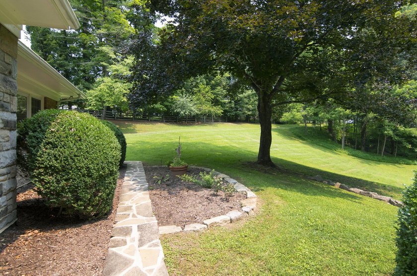 Welcome to this beautifully renovated one-level home, situated - photo 6