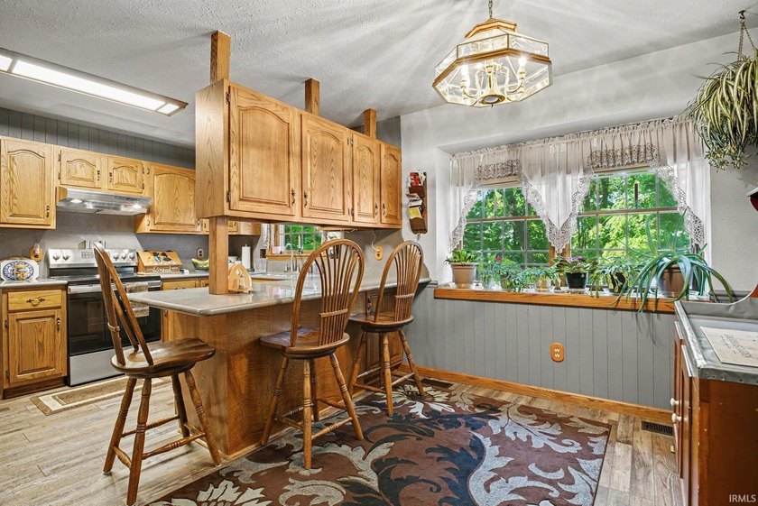 **Lakefront on 3.67 Acres - Hunter Lake!** One-owner home in - photo 9