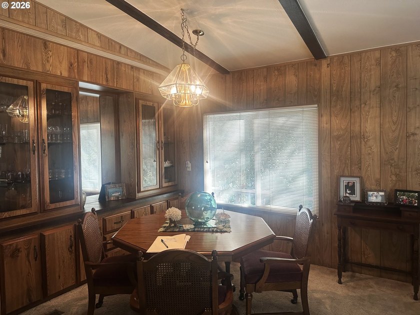 This well-maintained manufactured home is tucked in the hills - photo 12