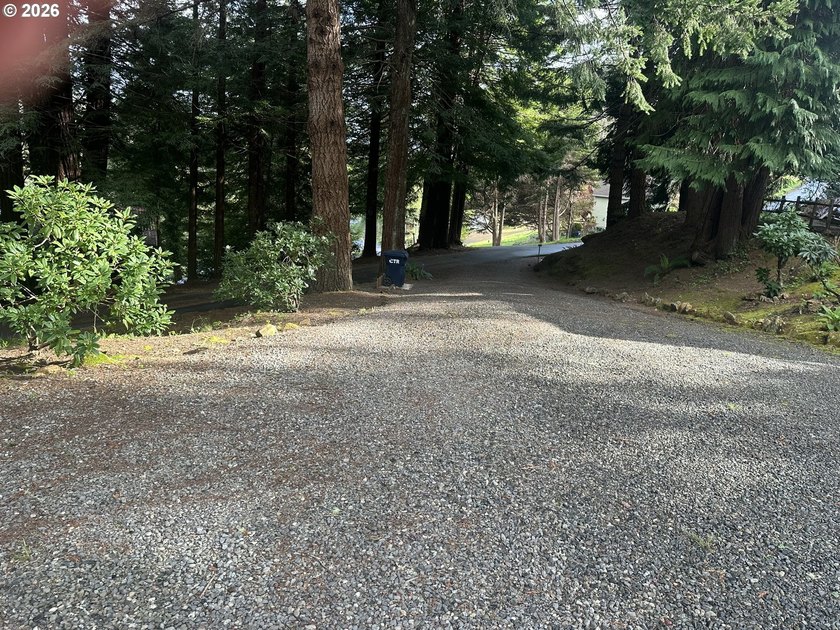This well-maintained manufactured home is tucked in the hills - photo 16