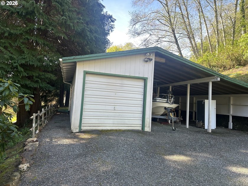 This well-maintained manufactured home is tucked in the hills - photo 17