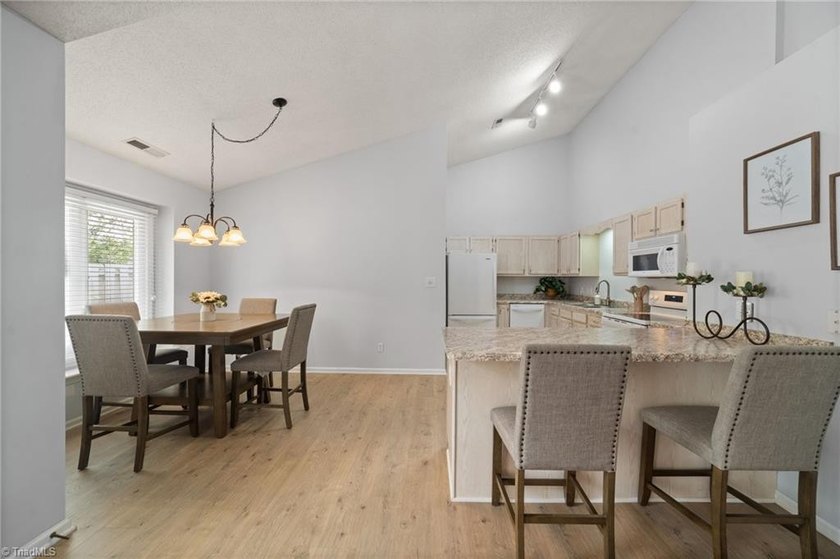 Enjoy effortless one-level living at Carmel by the Lake - photo 8