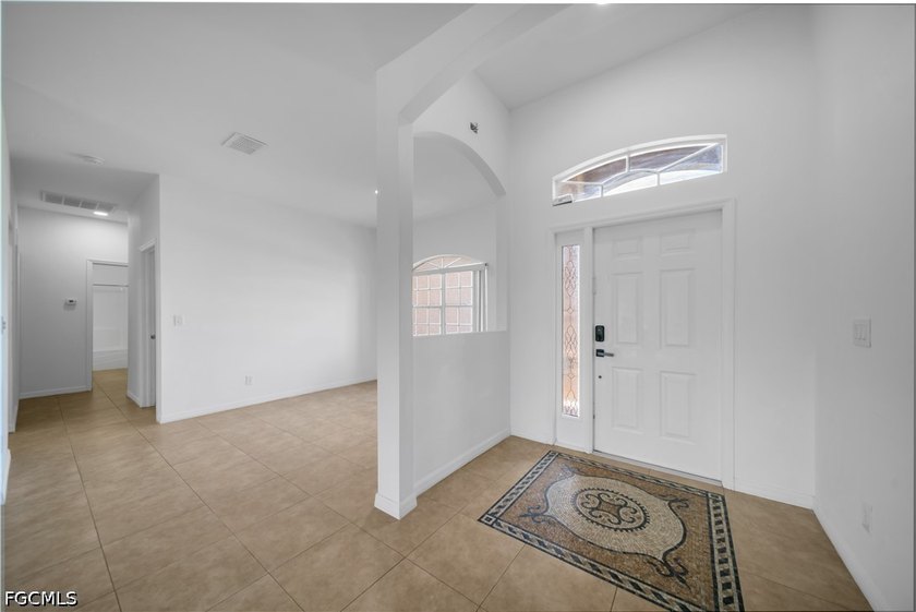 Rare in NE Cape Coral-this spacious corner-lot home offers city - photo 3