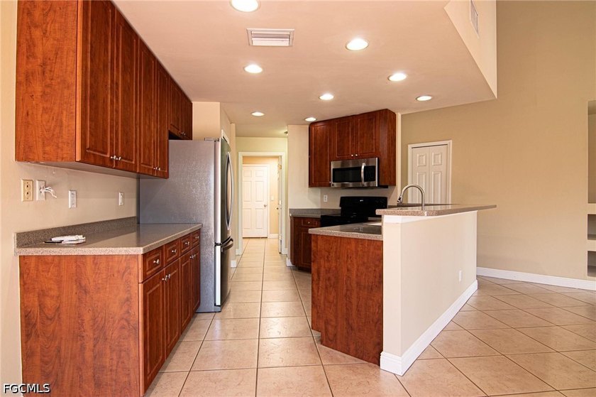 Wow! Very nice, custom built POOL home in fast growing NW Cape - photo 12