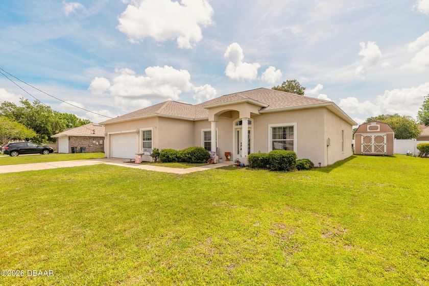 Welcome home to this beautifully maintained 4-bedroom - photo 2