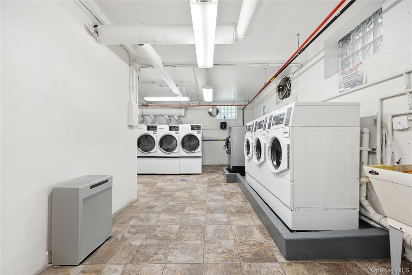 24 Hour Security, Gated Development, Laundry Room In Basement - photo 22