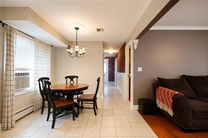 Tottenville-Fully detached two family home, 7 room duplex over a - photo 12