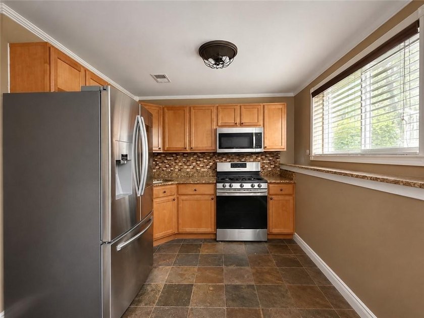 Tottenville-Fully detached two family home, 7 room duplex over a - photo 29