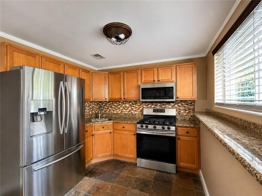 Tottenville-Fully detached two family home, 7 room duplex over a - photo 30