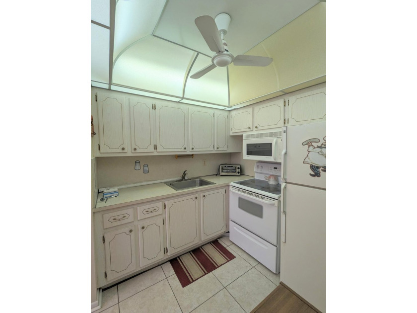 Located near the clubhouse and Haverhill gate, this desirable - photo 5