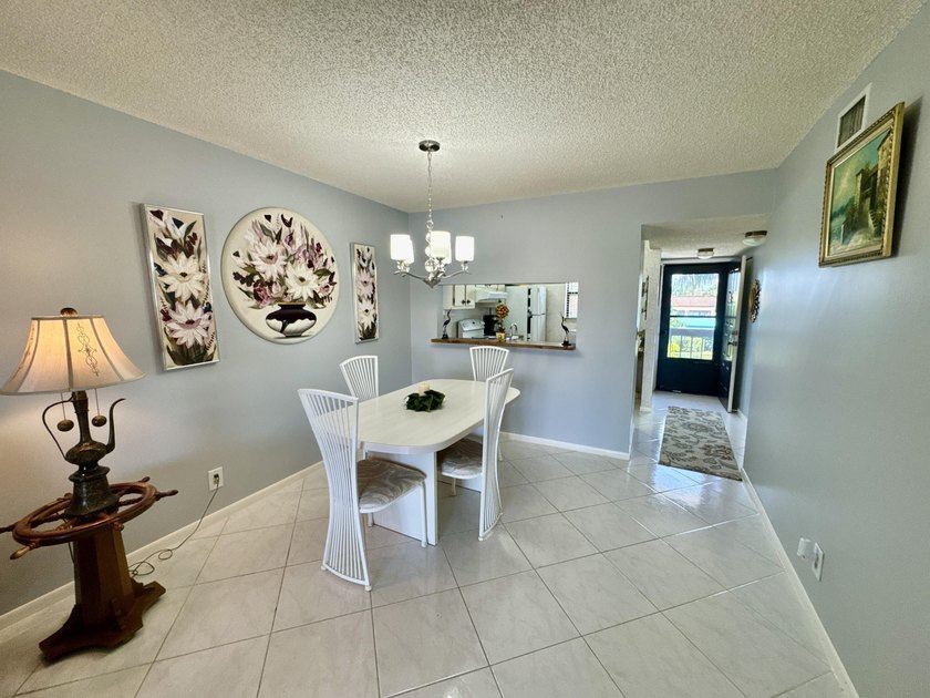 Welcome home to your well-maintained 2BR/2BA condo just steps - photo 12