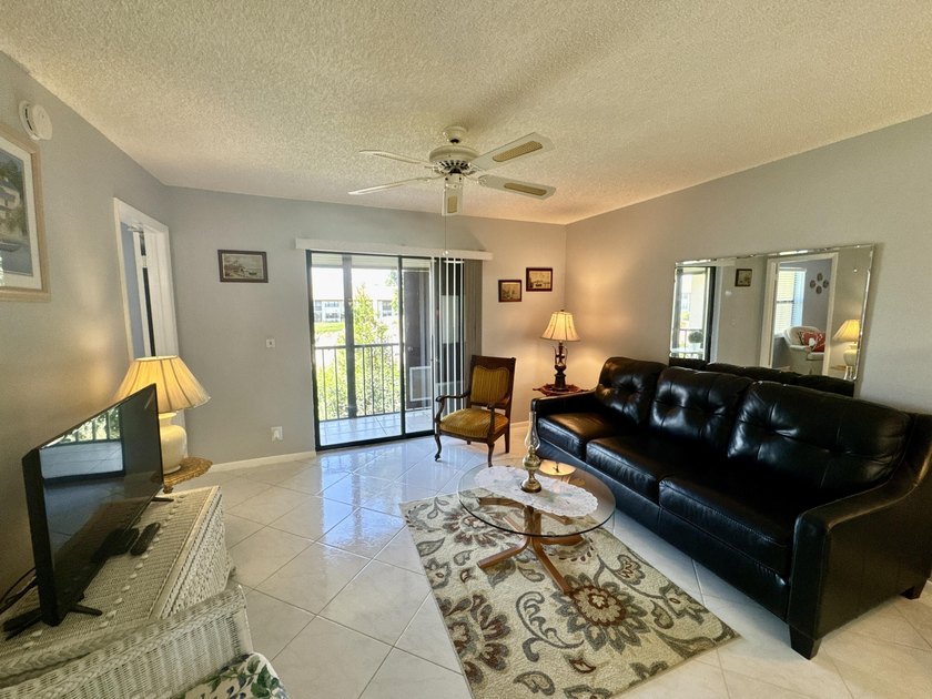 Welcome home to your well-maintained 2BR/2BA condo just steps - photo 14