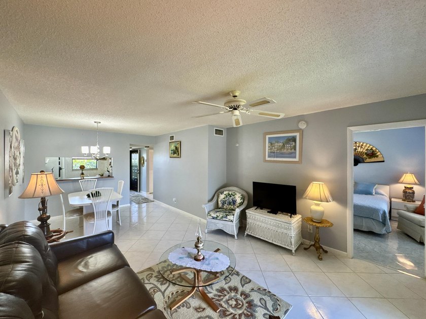 Welcome home to your well-maintained 2BR/2BA condo just steps - photo 16