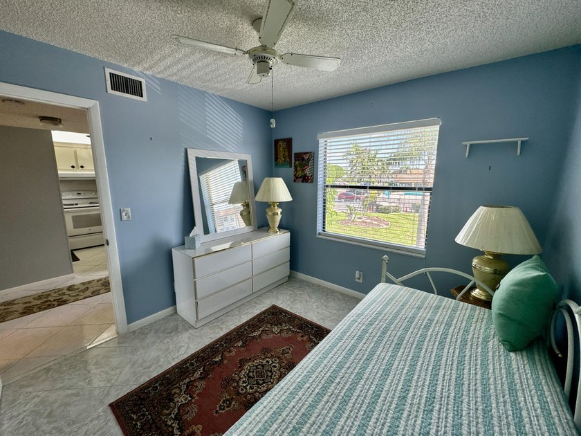 Welcome home to your well-maintained 2BR/2BA condo just steps - photo 25