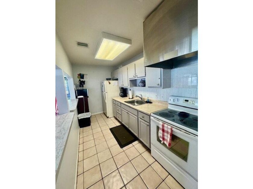 Welcome home to your well-maintained 2BR/2BA condo just steps - photo 42